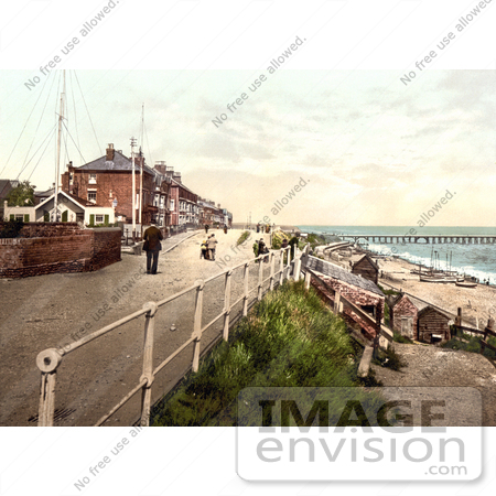 #26877 Stock Photography of People Walking On The Parade Promenade Near The Coast Guard Station In Southwell England by JVPD