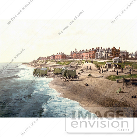 #26901 Stock Photography of People Near Boats And Bathing Machines On The Beach In Southwell England by JVPD
