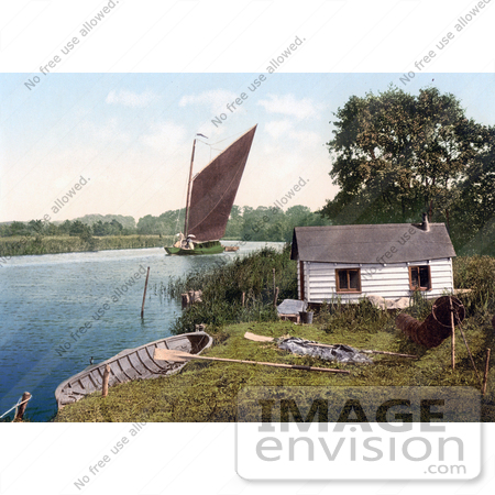 #26924 Stock Photography of Sailboat on the Bure River Near a Hut in Norfolk England by JVPD