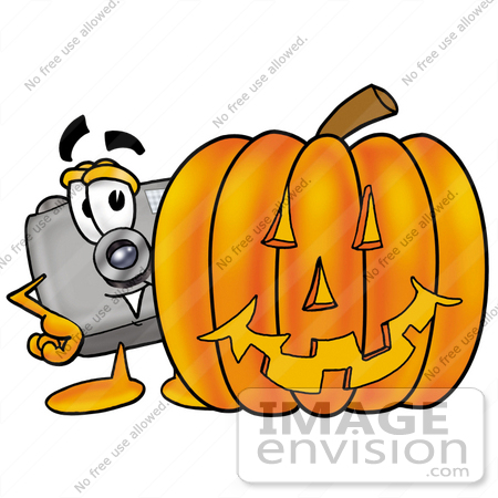 #28016 Clip Art Graphic of a Flash Camera Cartoon Character With a Carved Halloween Pumpkin by toons4biz