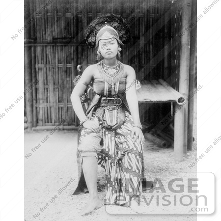 #30215 Stock Photo of a Female Javanese Dancer In Costume In Javanese Village At The Paris Exposition Of 1889, Seated In A Chair by JVPD
