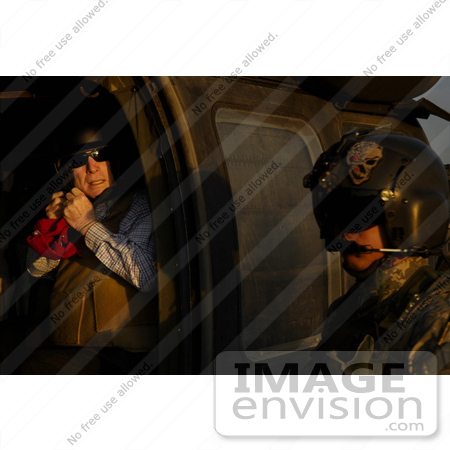 #30651 Stock Photo of Senator John McCain Preparing to Take Off in a UH-60 Black Hawk Helicopter From Sather Air Base, Iraq by JVPD