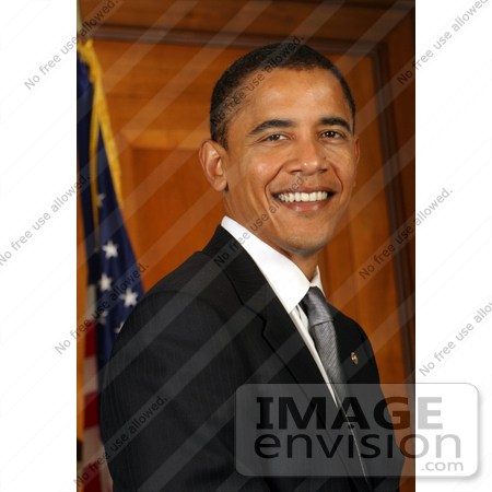 #34143 Stock Photo of Barack Obama, Junior United States Senator From Illinois And 2008 Presidential Nominee Of The Democratic Party, Smiling And Posing In Front Of An American Flag by JVPD