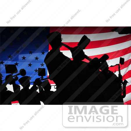 #35225 Stock Photo of a Silhouetted Band Against an American Flag by JVPD