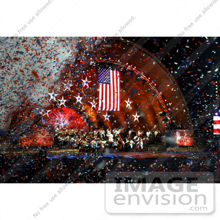 #35227 Stock Photo of Confetti Falling Around an American Flag at a Concert by JVPD