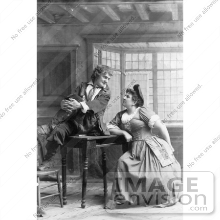 #35671 Stock Photo Of A Man, Actor Joseph Jefferson, Sitting On Top Of A Table And Gazing Into A Woman’s Eyes During A Performance by JVPD