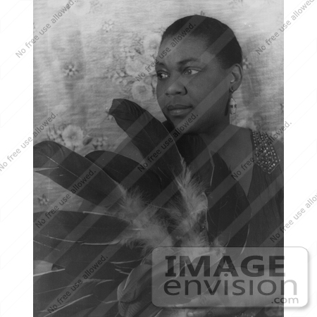 #38126 Stock Photo of Blues Singer Bessie Smith Holding Feathers And Looking Off to the Left by JVPD