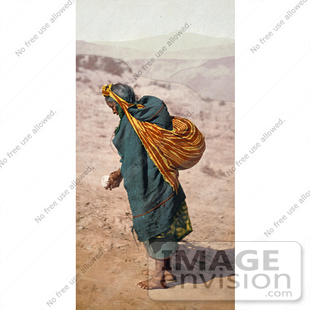 #40805 Stock Photo of a Lone Hopi Woman Walking Barefoot In Sand, Patient Toil, Moki Pueblos, Arizona by JVPD