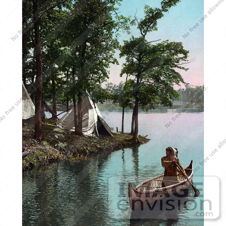 #40870 Stock Photo Of A Native American Indian Man Paddling Past Tipis In A Boat by JVPD