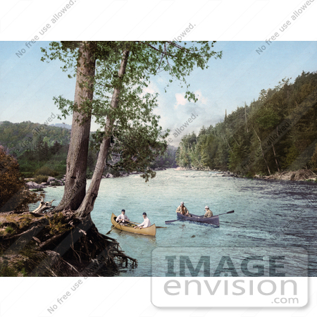 #41095 Stock Photo Of Four Men Canoeing In A Stream In The Adirondack Mountains, New York by JVPD