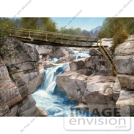 #41112 Stock Photo Of A Footbridge Over The Upper Falls Of The Ammonoosuc River In The White Mountains Of New Hampsire by JVPD