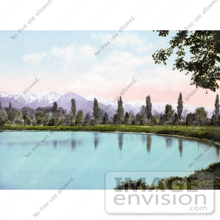 #41134 Stock Photo Of Trees Along The Water At Liberty Park, With Views Of The Wasatch Range Mountains, Salt Lake City, Utah by JVPD