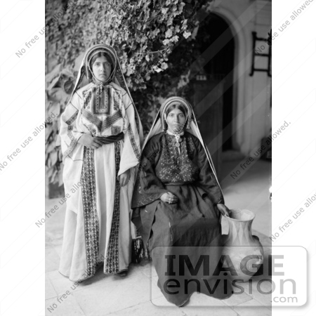 #43451 RF Stock Photo Of Two Young Ramallah Women In Black And White, One Sitting, One Standing by JVPD