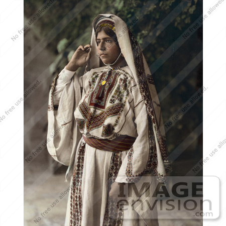 #43468 RF Stock Photo Of A Ramallah Woman Standing In A Traditional Dress by JVPD