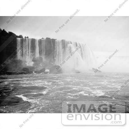 #48810 Royalty-Free Stock Photo Of A Scene Of Horseshoe Falls, Niagara Falls Rushing Down Over Boulders by JVPD
