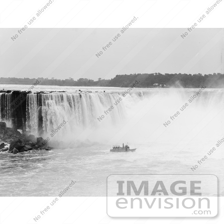 #48815 Royalty-Free Stock Photo Of A Steamboat In The Mist At The Bottom Of Horseshoe Falls, Niagara Falls by JVPD