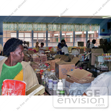 #5066 Stock Photography of Disaster Relief Volunteers Organizing Food for the Victims of Hurricane Hugo by JVPD