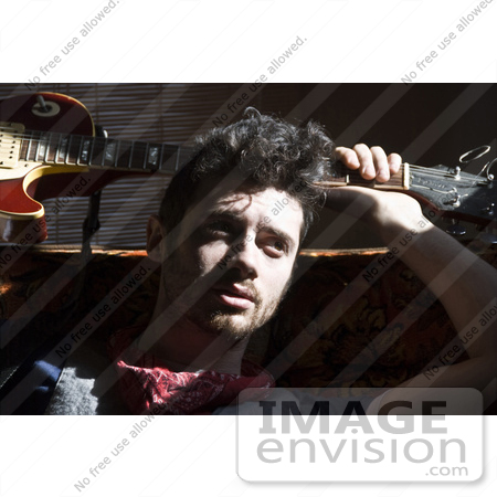 #56134 Royalty-Free Stock Photo of Guitar Man Max by Maria Bell