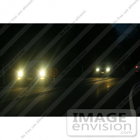 #603 Picture of Bright Car Lights at Night by Kenny Adams