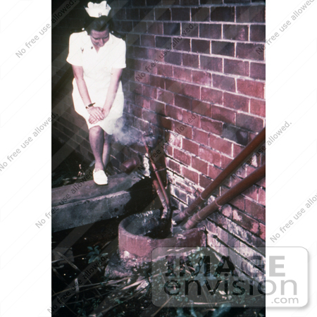 #6307 Picture of a Nurse Standing Near Sewage Pipes Outside of an Infectious Disease Hospital in Johannesburg, South Africa by KAPD