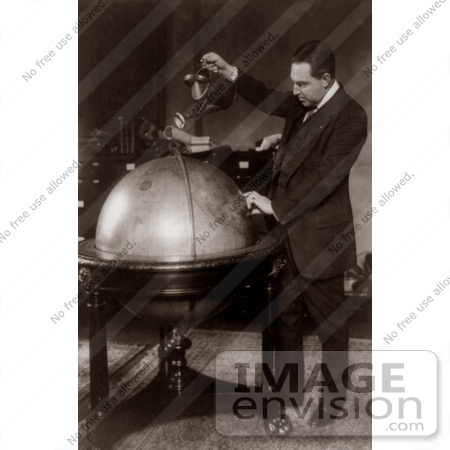#7450 Stock Photograph of John Phillip Hill Pouring Water on Globe, Prohibition by JVPD