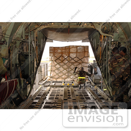 #8894 Picture of a Soldier Loading a C-130 Aircraft by JVPD