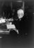 #10839 Picture of Andrew Carnegie Reading at a Desk by JVPD