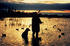 #15551 Picture of a Hunter and His Dog Wading in a Marsh, Duck Hunting by JVPD