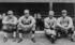 #41223 Stock Photo of Four Baseball Players, Babe Ruth, Ernie Shore, Rube Foster, And Del Gainer Of The Boston Red Sox, Sitting Together by JVPD