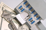 Model House, House Key and Cash