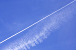 Smoke Trails in a Blue Sky