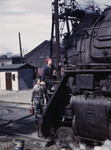 Photo of Riveter Women Wiping Trains in the Chicago and North Western Railroad, 1943