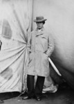 Lewis Payne Standing in an Overcoat and Hat