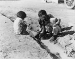 Children Playing in Ditch