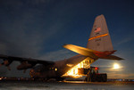 Loading Hay Into C-130 Hercules
