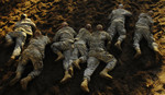 Soldiers Crawling on Ground