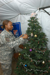 Army Sgt Decorating Christmas Tree