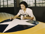Rosie Painting the American Insignia