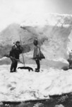 Eskimo and Man in Winter Scene