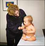 Physician Examining a 9 Month Old Baby