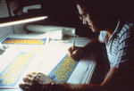 1980’s Graphic Artist Travis Benton Working at a Drafting Table