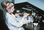 Nurse Working with a Mycology Lab Training Kit - 1970