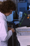 Scientist Using a Multi-Channel Pipette to Dispensing Lab Samples