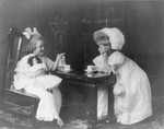 Little Girls Playing Tea