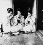 Three Women Drinking Tea