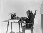 Chimpanzee Using Typewriter