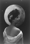 Woman Posed in Front of Moon