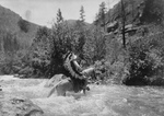 Bullchief Crossing River on Horseback