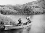 Lakota Indians in a Canoe