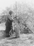 Wichita Indian Using a Mortar and Pestle